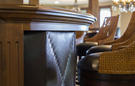 basement-finishing-custom-bar-leather-panels Basement Finishing Custom Bar Leather Panels