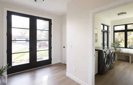 contemporary-model-home-foryer-laundry-room Contemporary Model Home Foyer Laundry Room